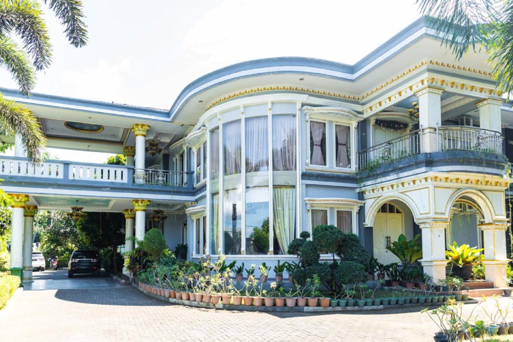 레드도어즈 프리미엄 @ 씨 레지던스 마나도 (RedDoorz Premium @ Sea Residence Manado) 객실 및 시설