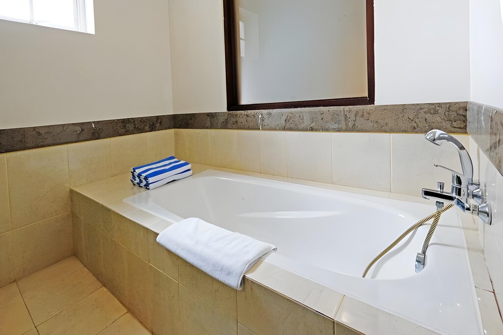 더 벨레자 스위트 바이 네무루 (The Bellezza Suites by Nemuru) 객실 및 시설