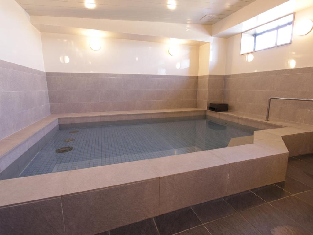 호텔 뉴 가에아 니시구마모토-에키마에 (Hotel New Gaea Nishikumamoto-Ekimae) 객실 및 시설